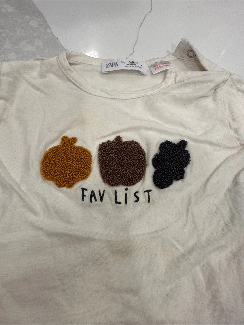 Zara Cream Tee with Mustard, Brown and Black Fruit Appliqués